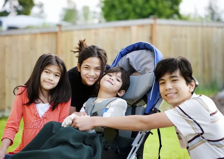 Special Needs boy and siblings together