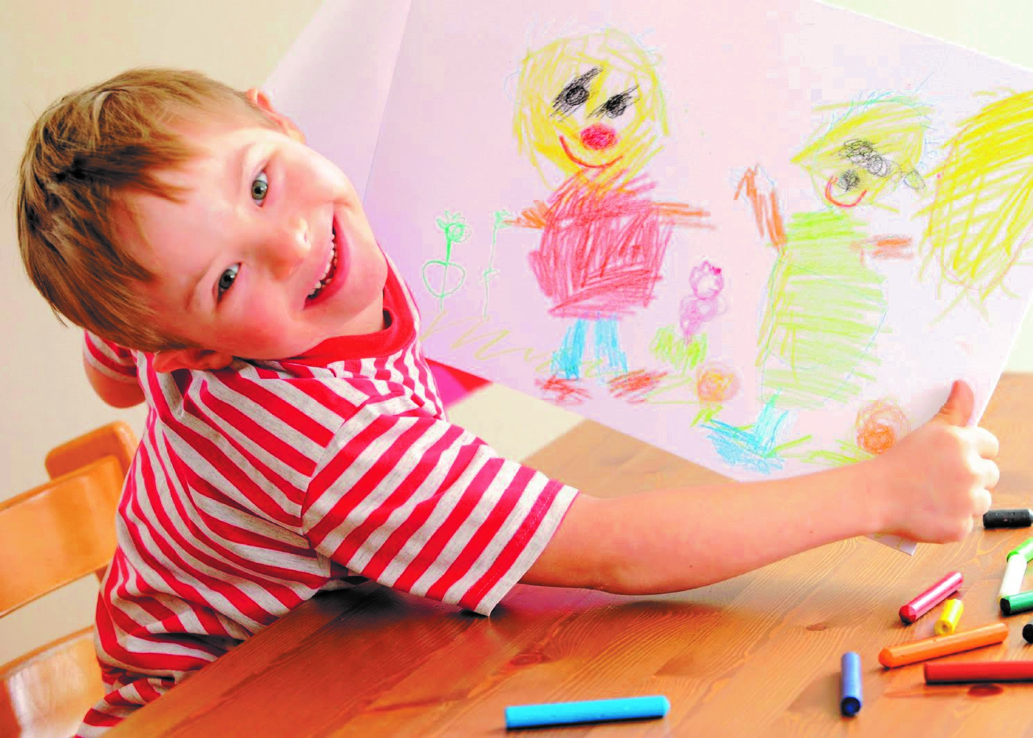Boy with Special Needs shows his drawing